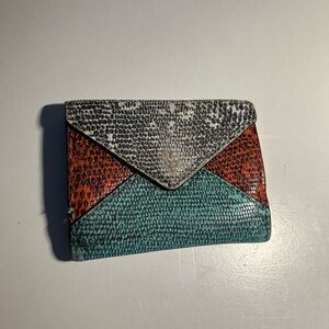 Rebecca Minkoff Black, Red, and Teal Leather folding travel wallet